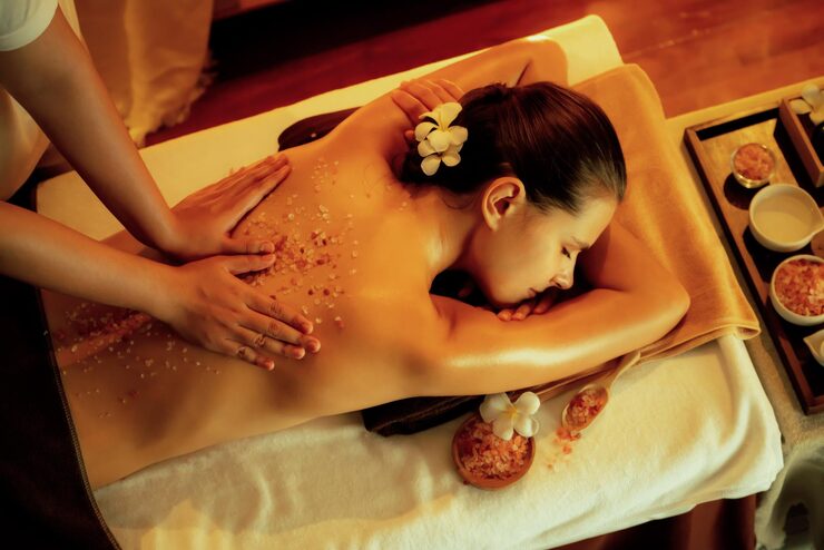 woman-customer-having-exfoliation-treatment-luxury-spa-quiescent_31965-434990